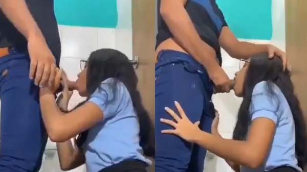 The college girl is giving a blowjob to her boyfriend while having fun.