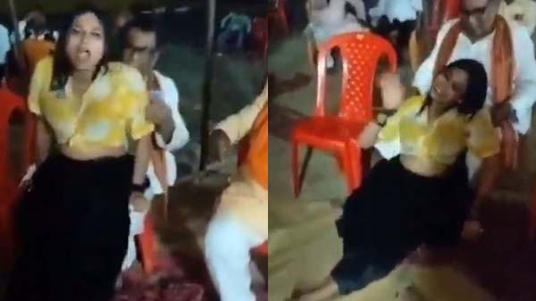 An orchestra dancer is giving pleasure to the village uncle in a playful, fun-filled mood.
